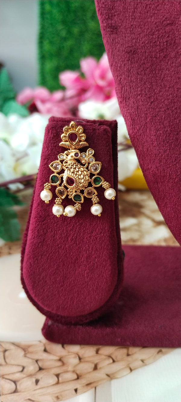 stunning gold-plated long haram featuring an elegant swan locket