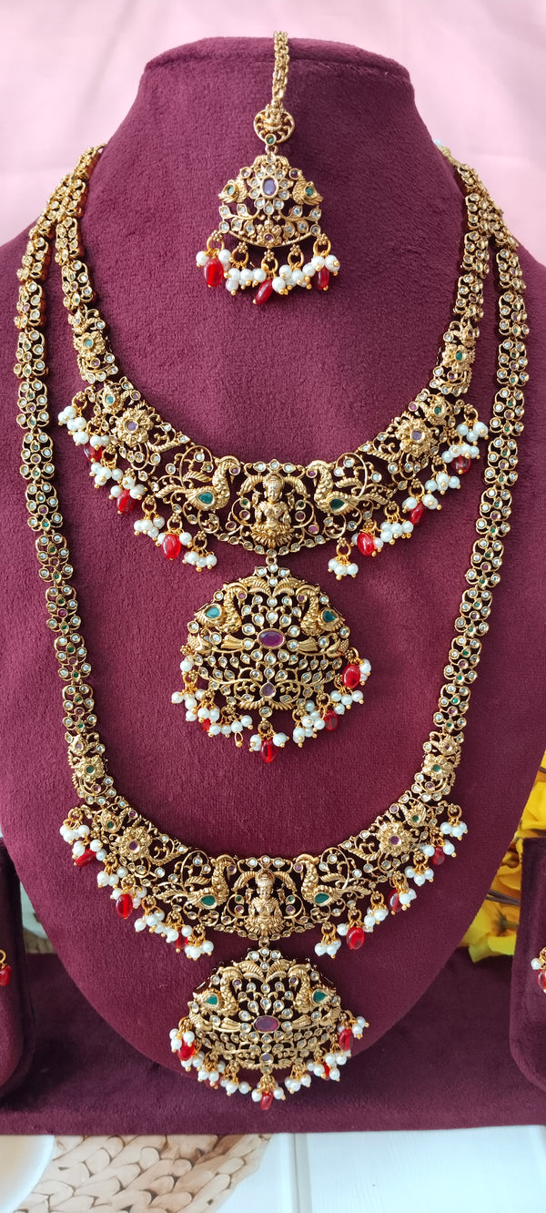 one gram gold combo set includes two exquisite pendants—Subh Laxmi, symbolizing blessings and prosperity, and a graceful Swan