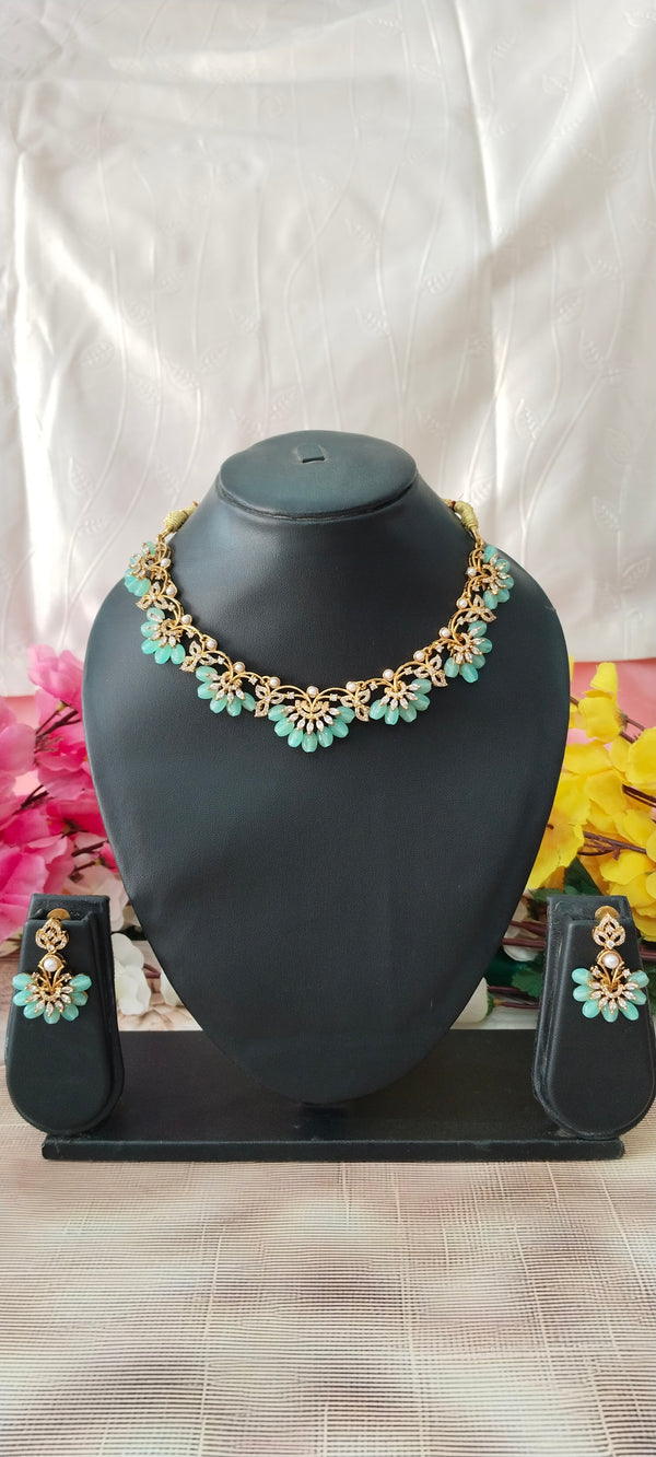 Elegant and timeless, this gold-plated beaded necklace is crafted with high-quality plating
