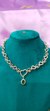 A charming heart necklace chain featuring a vibrant green pendant.