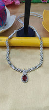 A beautifully crafted silver neck set, perfect for adding elegance and sparkle to weddings, parties, and festive occasions.