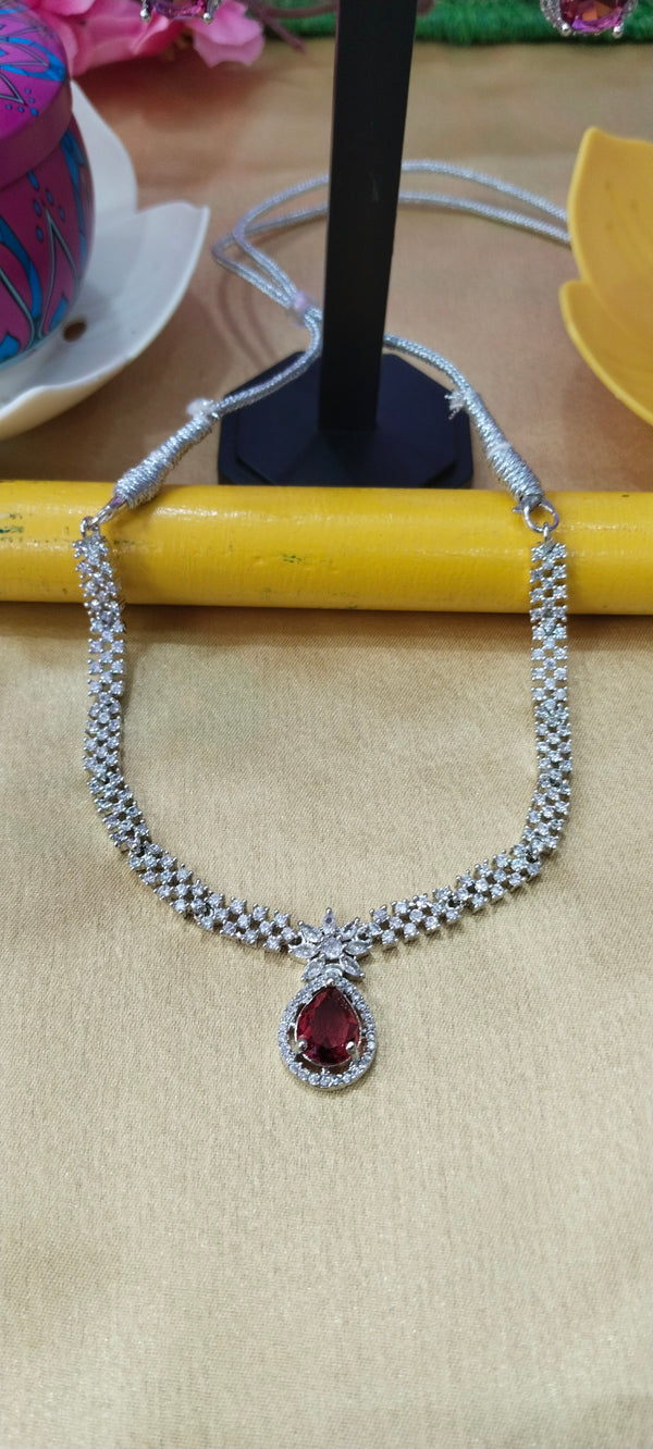 A beautifully crafted silver neck set, perfect for adding elegance and sparkle to weddings, parties, and festive occasions.