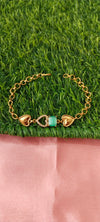 Gold Bracelet with Heart-Shaped Charms