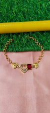 Gold Bracelet with Heart-Shaped Charms with red pendent