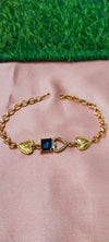 Gold Bracelet with Heart-Shaped Charms with blue pendent