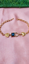 Gold Bracelet with Heart-Shaped Charms with blue pendent