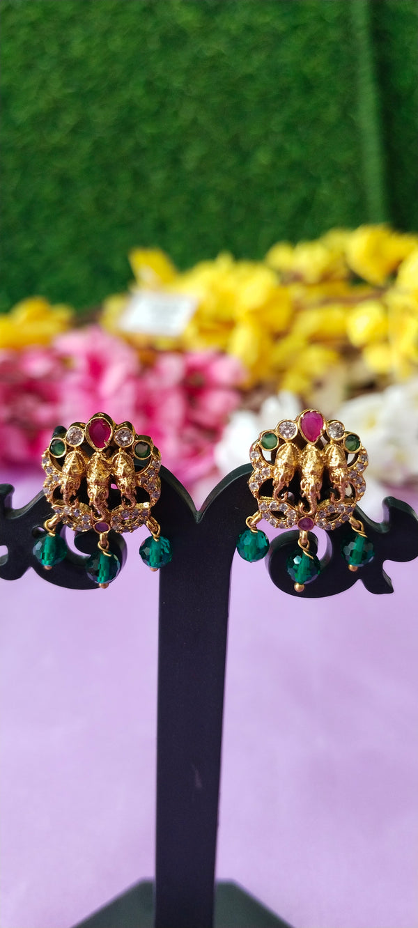 Golden kante cz elephant locket with matching earrings