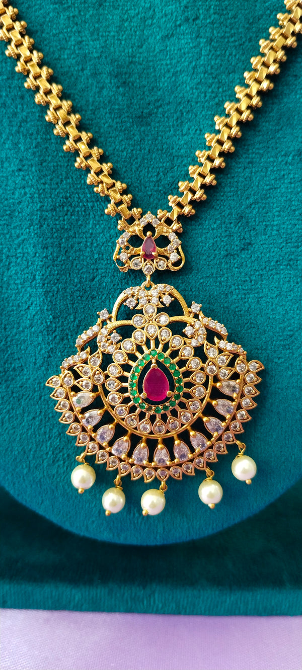Premium Golden Kundan pendant with matching earrings