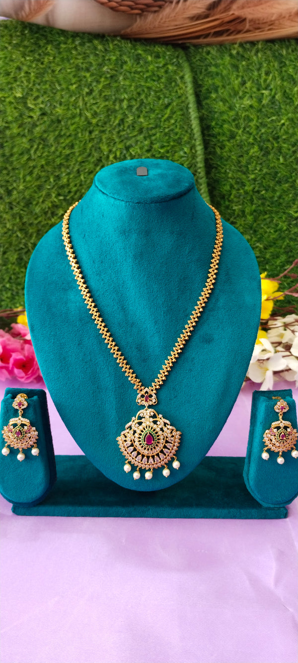 Premium Golden Kundan pendant with matching earrings