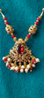 Swan pendant with golden balls and red stones no earrings