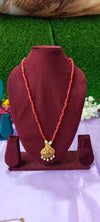 Red colour beads gold plated pendant with no earrings