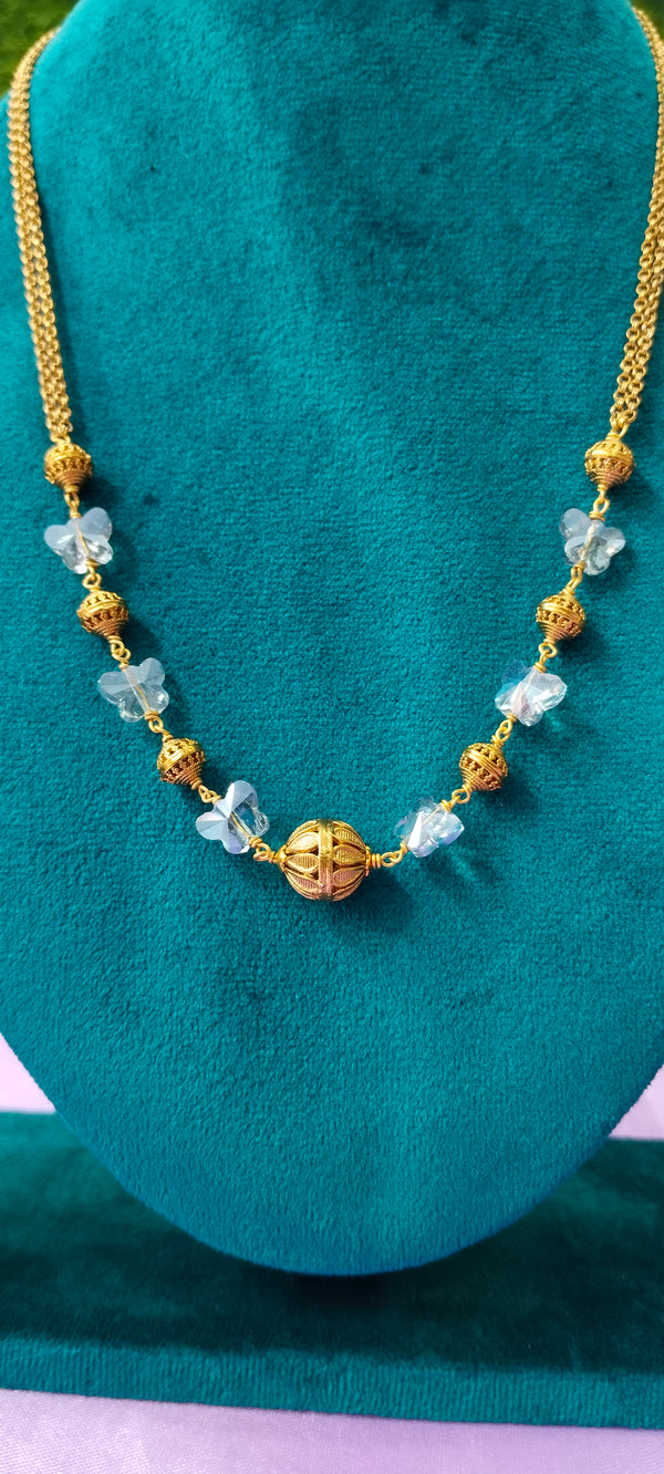 Gold plated nakshi balls purple colour stone with no earrings