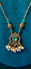 Gold plated Sea green colourpendant with white stone