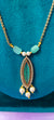 Elegant Gold-Plated Pendant with Sea Green Stone