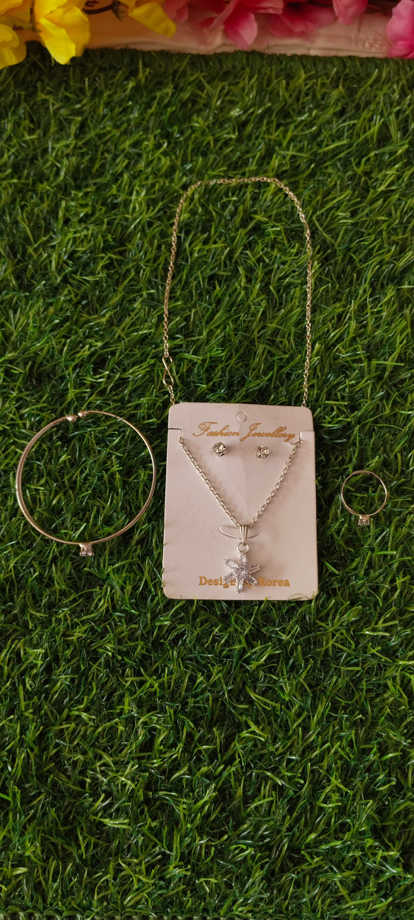 Ring and bracelet combo connected with a chain