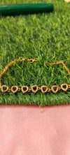 Gold Bracelet with Heart-Shaped Charms