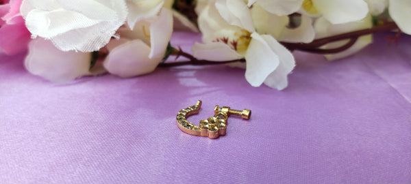 Gold Finish Floral Motif Studded Kundan Nose Ring