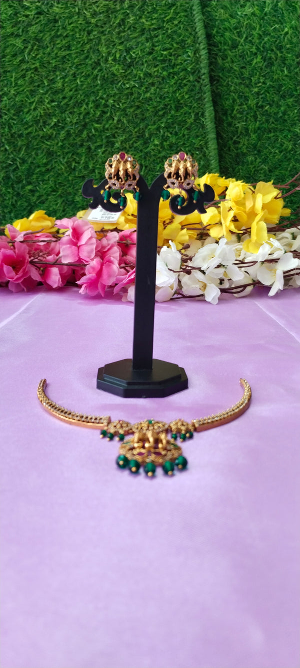 Golden kante cz elephant locket with matching earrings