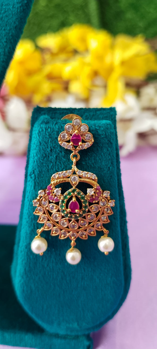 Premium Golden Kundan pendant with matching earrings