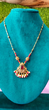 Swan pendant with golden balls and red stones no earrings