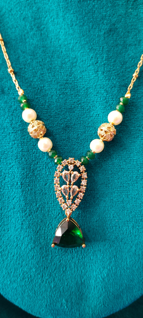 Cz and Green stone pendant with gold balls no earrings