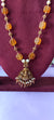 Long premium laxmi locket with gold balls and white pulse and orange stone no earrings