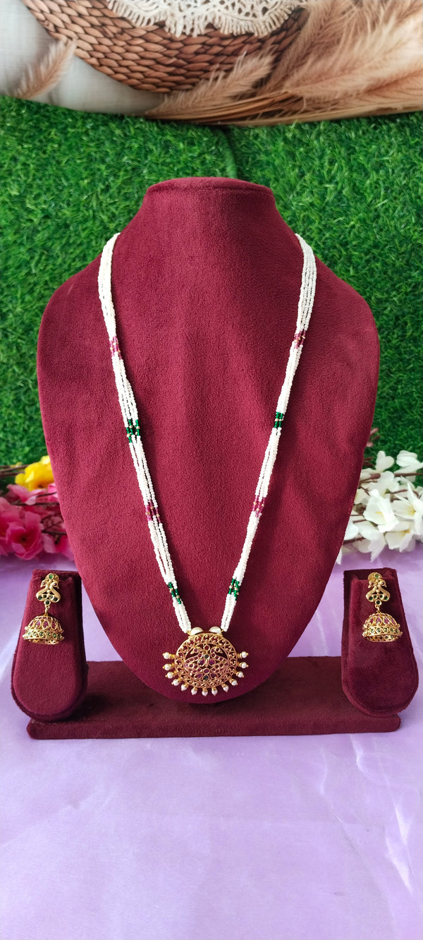 White Crystal beads chain with golden locket & earrings