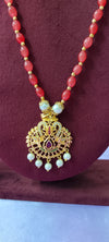 Red colour beads gold plated pendant with no earrings