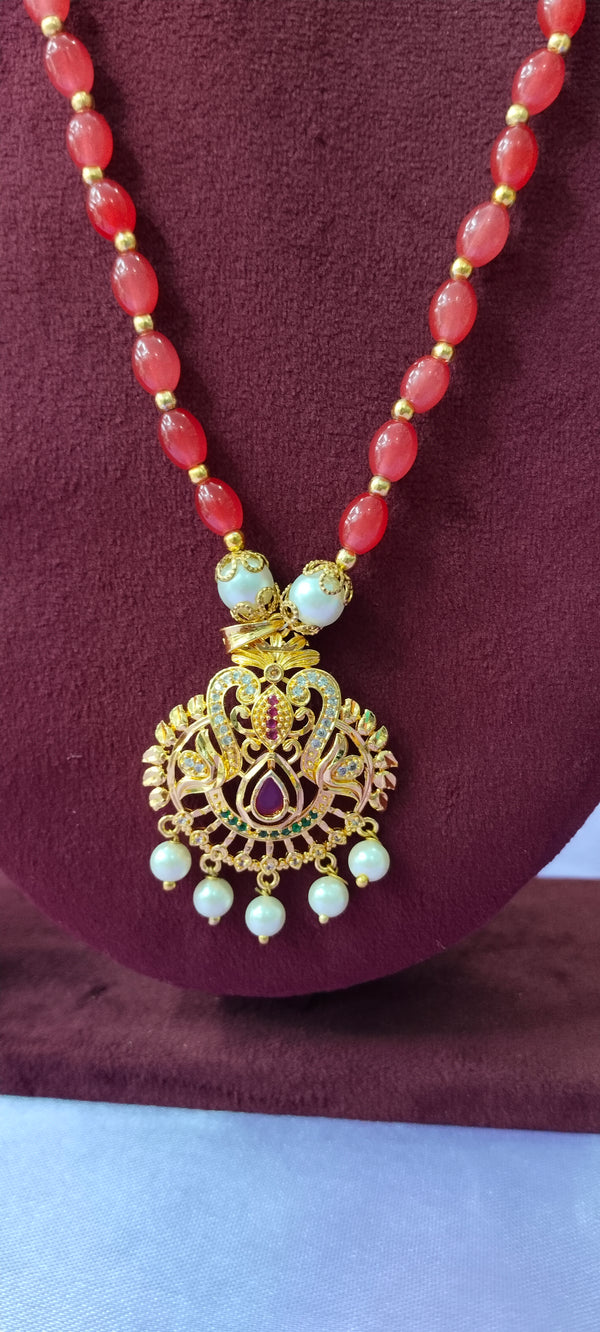 Red colour beads gold plated pendant with no earrings