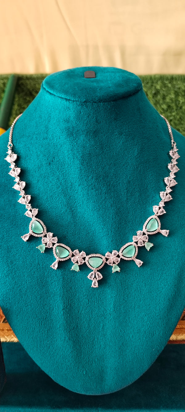 Adorable adorned with premium American Diamonds sea green necklace