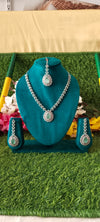 Luxurious american diamond white & sea green pendant with mangtikka