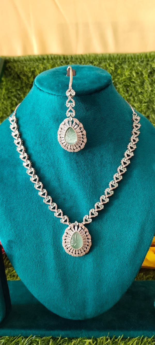 Luxurious american diamond white & sea green pendant with mangtikka
