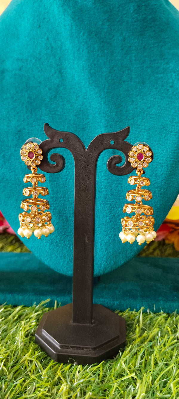 gold plated grace and sophistication look String Earrings
