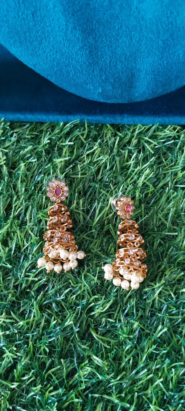 gold plated grace and sophistication look String Earrings