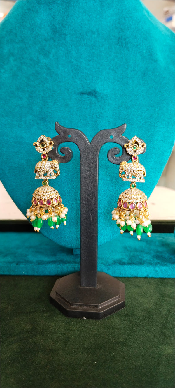 Gold plated elephant idol earrings