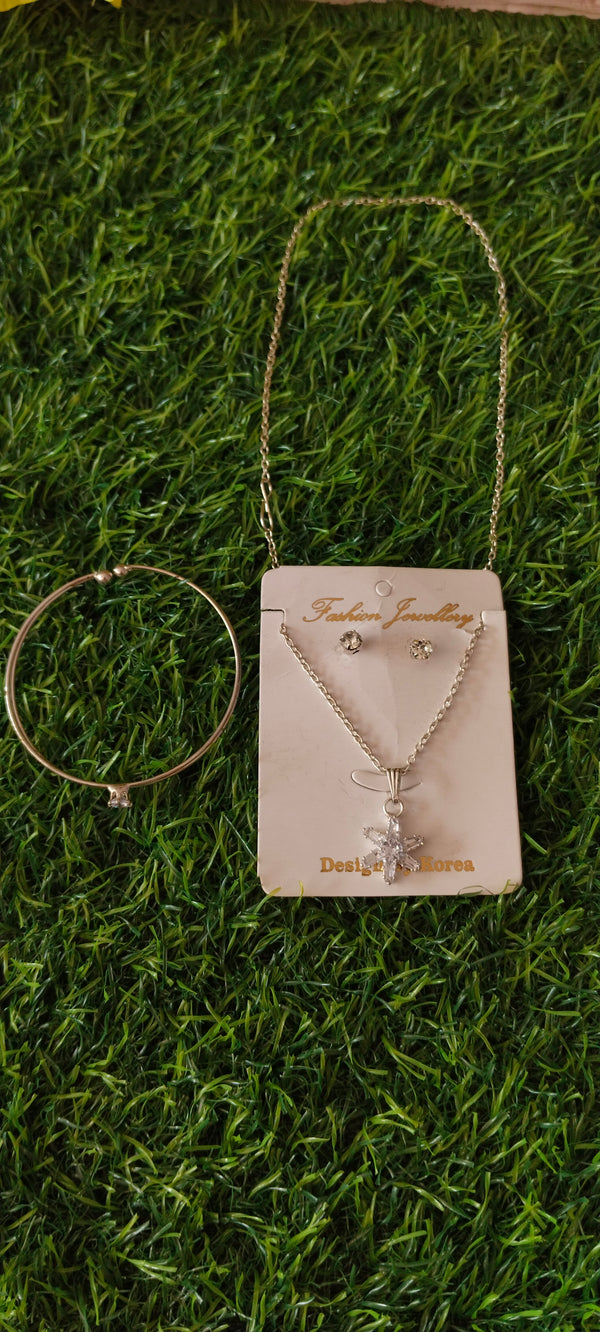 Ring and bracelet combo connected with a chain